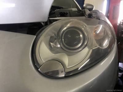 Фара Jaguar XKR до внутренней чистки и полировки стекла