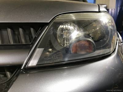 Оптика автомобиля Mitsubishi Outlander после модернизации