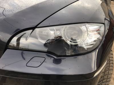 Замена треснувшего стекла фары BMW X6
