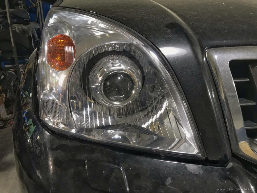 Установка бі-лінзи у фару Toyota Prado